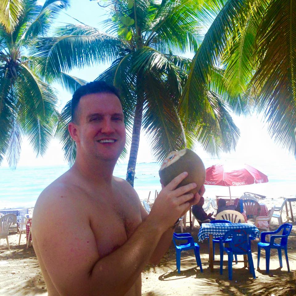 Drinking fresh coconut water at the beach