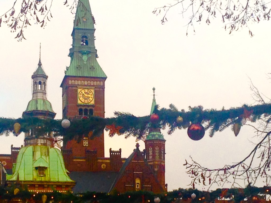 A glimpse of the World Clock at City Hall from Tivoli Gardens